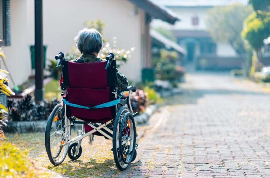 Older women with Alzheimer's in wheelchair